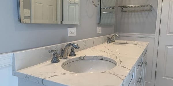 Updated white and silver bathroom remodel